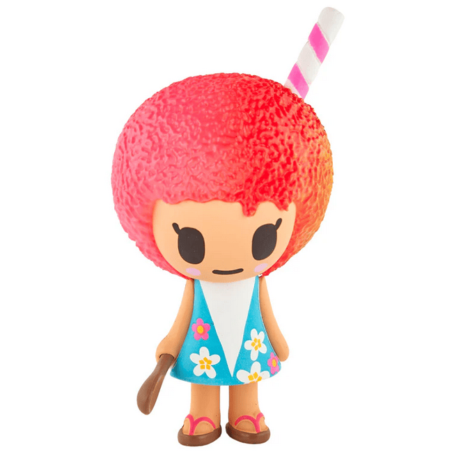 A tokidoki Hawaiian Ohana Blind Box figure featuring a big, textured pink head with a striped straw, wearing a blue floral dress and sandals, holding a brown item—ideal for fans of cute tropical collectibles.