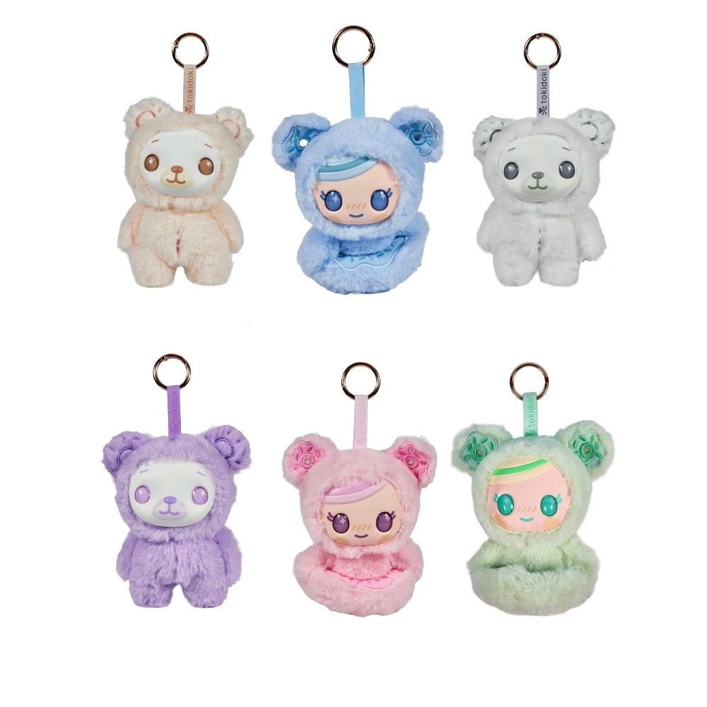 Six tokidoki Soft & Sweet Vinyl Plush Blind Boxes are arranged in two rows, featuring bear-themed and doll-faced pastel designs, creating an adorable pastel plush collection from tokidoki.