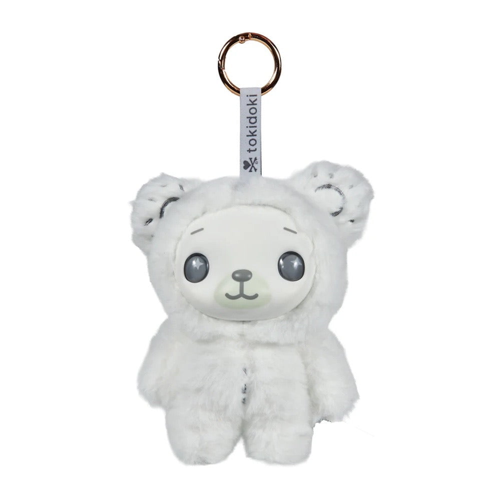 A Tokidoki Soft & Sweet Vinyl Plush Blind Box keychain featuring a pastel white bear with a round face, large black eyes, a tokidoki label, and attached to a gold keyring.