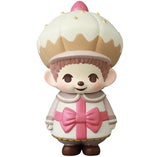 The VAG 45 — Monchhichi Happy Gift Box by Medicom is a Japanese vinyl toy featuring a cupcake hat, big ears, white outfit with a pink bow and brown accents, shown against a plain background.