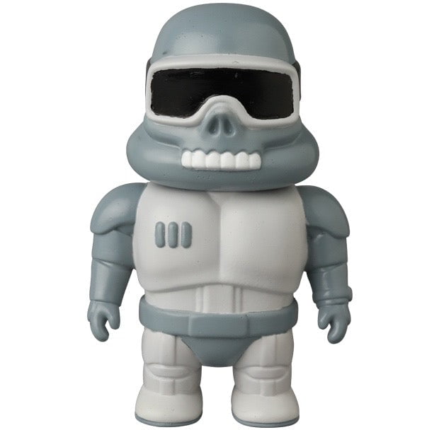The Medicom VAG 45 — Space Controller is a stylized gray and white armored toy with a helmet, black visor, and skeletal teeth—ideal for fans of Japanese vinyl toys like Vinyl Artist Gacha figures.