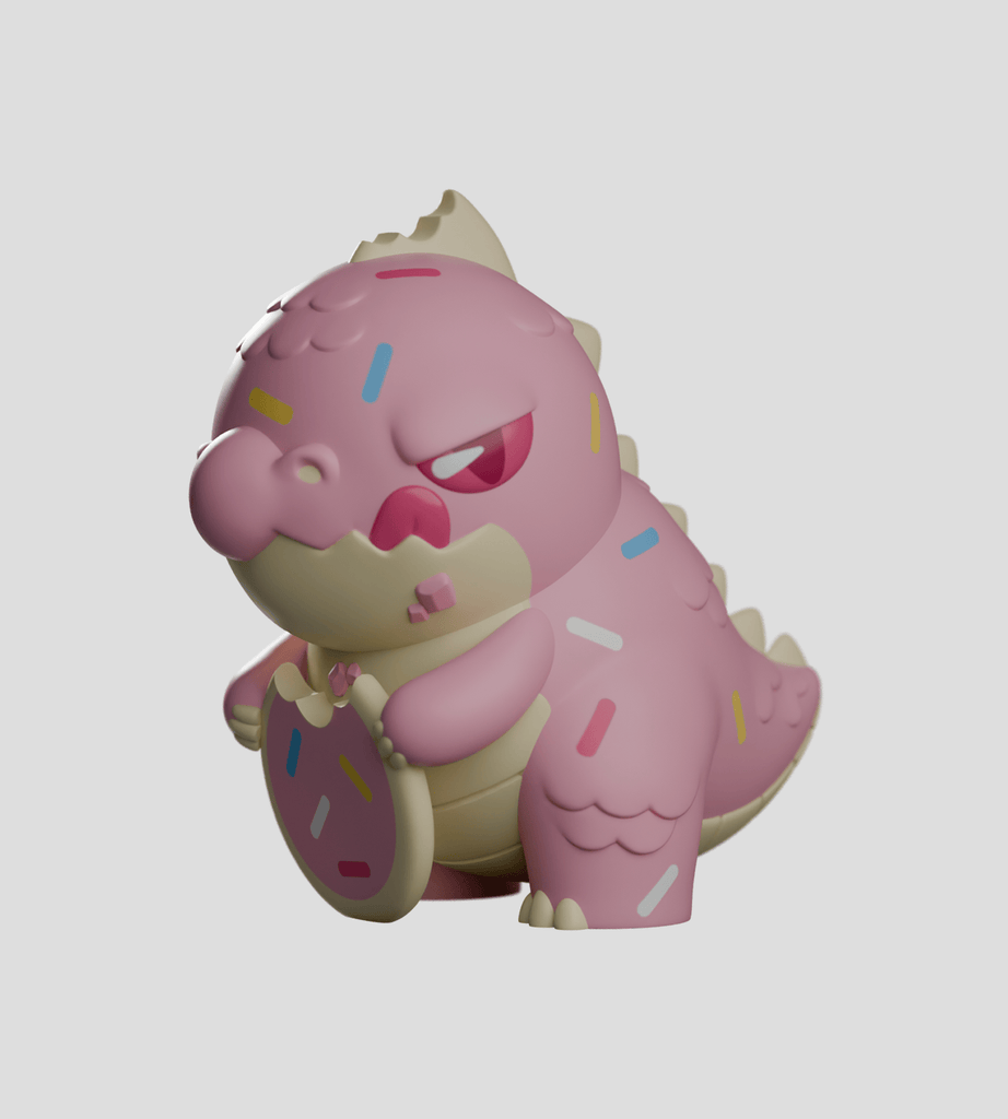 A cute pink Kaiju Cookies dinosaur by Kaleidos Creative holds a bitten frosted cookie, covered in sprinkles, against a plain light background. From the Kaiju Cookies Blind Box series.