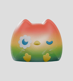 Kairos the Owl Blind Box by Kaleidos Creative is a round, cat-shaped toy with a red-yellow-green gradient body, yellow feet, daisy-shaped eye, and closed blue eye—an adorable addition to any blind box collection.
