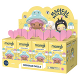 Display box of Momiji Magical Meadow Message Dolls Blind Box by Momiji, featuring colorful collectible figures with mushroom and bug hats, and several individual blind boxes arranged in rows.