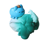The Partner Toys Bugcat Capoo — National Palace Museum Adventure Blind Box features a blue Bugcat Capoo figurine with a croissant on its head and a small light blue insect, displayed on a green leaf against a white background.