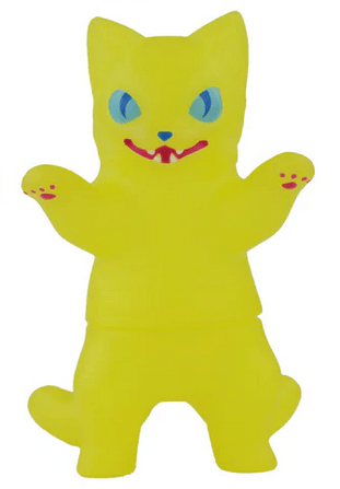 The Konatsuya Negora Color Palette features a yellow, cartoon-style kitty kaiju figurine with blue eyes, a red mouth, and raised front paws, shown standing upright against a white background.
