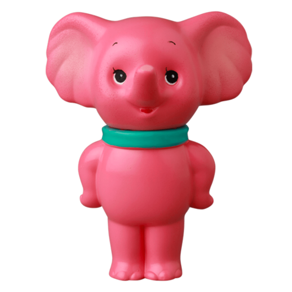 The VAG 43 — ZOU by Medicom is a pink cartoon elephant figurine with large ears, a teal collar, and a smiling face, inspired by Japanese vinyl toy design, shown upright against a white background.