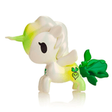 The tokidoki Veggie Unicorno - Daikon Special Edition Figure is a small white figurine with green accents, wings, a leafy tail, and a smiling radish graphic on its hind leg.