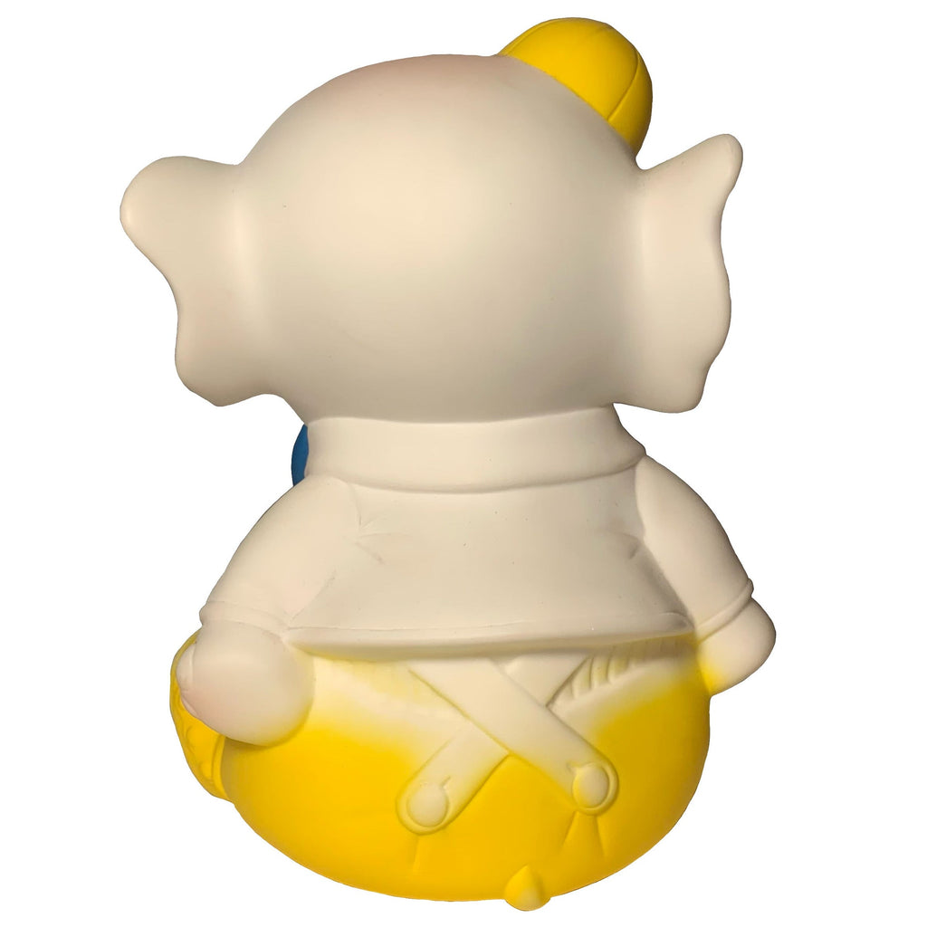 The Bitter Squeaks Yellow Bowtie Baby Elephant is a vinyl figure seen from the back, featuring a baby elephant in a white shirt and yellow pants, styled like a plush toy with its arms at its sides.