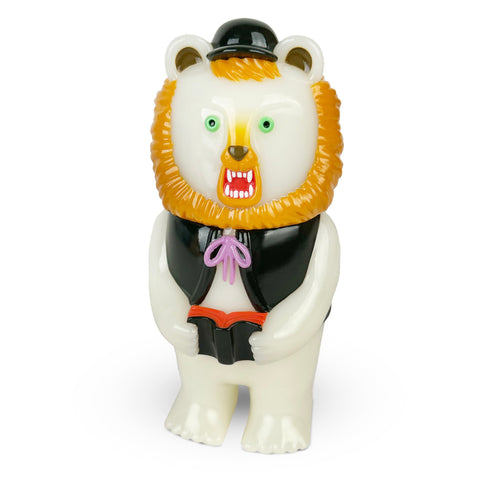 Morichan — No. 3 by Paradise Toy is a toy bear figurine with a yellow mane, black hat and vest, white body, purple bow, and holding an open red book.