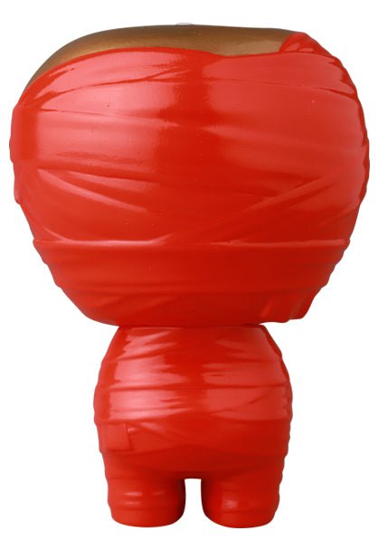 The VAG 41 — Yummy Mummy by Medicom is a small, head-heavy Japanese vinyl toy, fully wrapped in shiny red tape from head to toe and facing away to display its back.