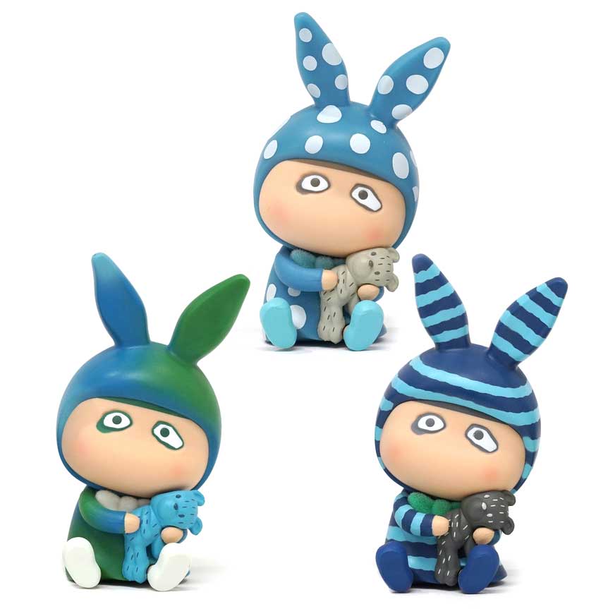 The A Boy — Mini Sitting Set by How2Work features children in bunny ear hats with stuffed animals, dressed in blue and green striped and polka-dotted outfits.