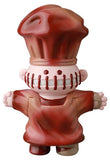 The Medicom VAG 39 — Butcher is a Japanese vinyl toy chef figure with a tall red hat, apron, stitched mouth, and outstretched arms—an eye-catching collectible for gachapon enthusiasts.