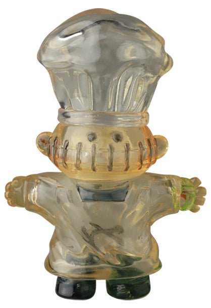 Medicom’s VAG 39 — Butcher is a clear plastic Vinyl Artist Gacha chef figurine with outstretched arms, chef hat, and a stitched-smile—an ideal collectible for fans of Japanese vinyl toys and gachapon figures.
