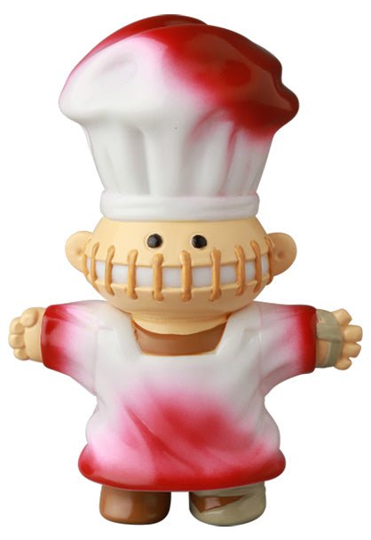 The Medicom VAG 39 — Butcher is a Japanese vinyl toy chef with a white and red hat, stitched mouth, and outstretched arms—part of the Vinyl Artist Gacha gachapon figures collection.