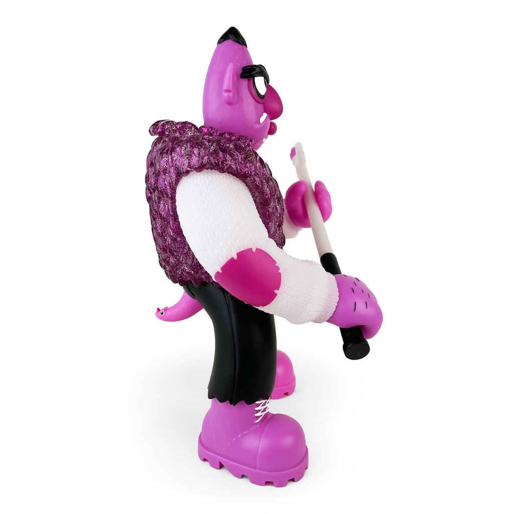 A side view of Bernie — Purple Reign Rotofugi Exclusive by UFO Toys, a purple cartoon monster sofubi figure with glasses, white shirt, textured vest, black pants, and white cane—a unique collectible.