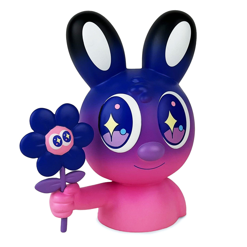 Blake Jones' Flower Picker — Twilight by UVD Toys is a cute pink and purple bunny figure with big shiny eyes, holding a blue flower with a face—an adorable collectible for fans and toy lovers.