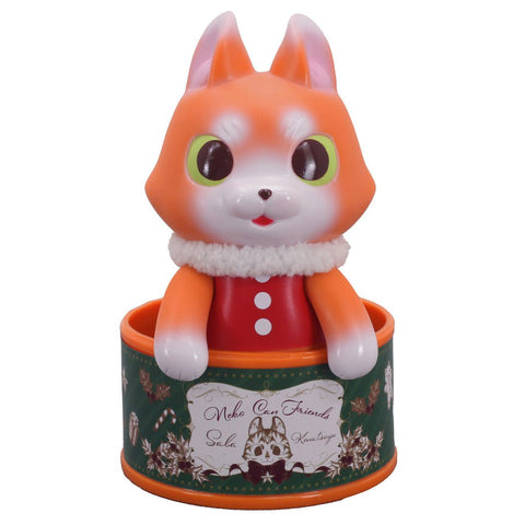 The Can Cat Friend — SABA Santa by Konatsuya is a plastic orange cat figurine in a red outfit with green eyes, packaged in a festive round container—making it an ideal collectible for Christmas 2023.