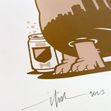 A close-up of a can and hand in brown tones with signature and