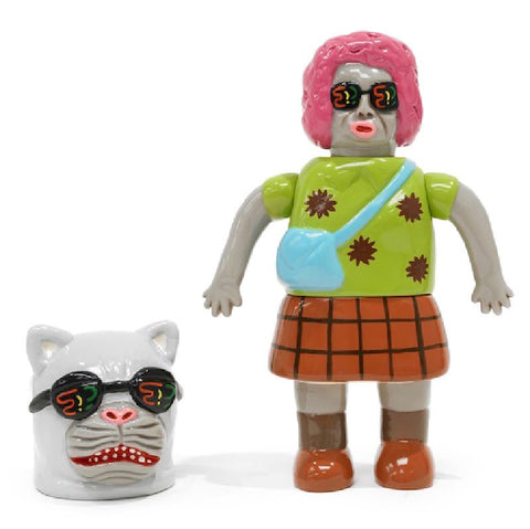 The Paradise Toy "About Animals Koala Obasa—Panther 2nd" is a toy figure with gray skin, pink hair, sunglasses, a green shirt with brown spots, plaid skirt, blue purse, and an extra cat head with sunglasses beside it.
