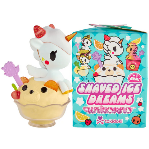 A collectible tokidoki toy unicorn perches on a bowl of yellow shaved ice with fruit and a purple spoon, beside a vibrant Shaved Ice Dreams Unicorno Blind Box adorned with adorable unicorns and fruit.