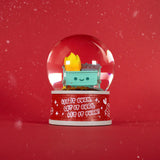 The 100% Soft Dumpster Fire Snow Globe shows a smiling dumpster with cartoon flames inside, snow-like specks, and a base that says