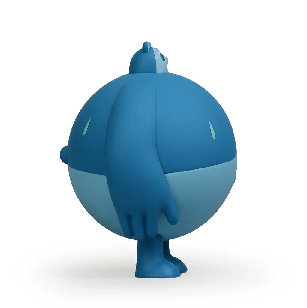 A blue toy sphere with a Sugar Booger Vinyl Figure body by Heavy Cream.