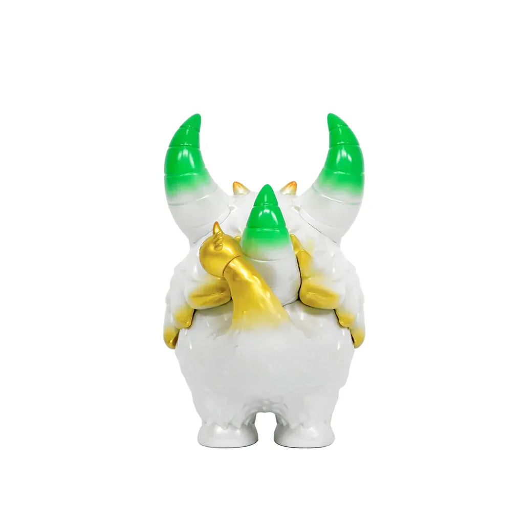 Rangeas Rex Jr. — White & Gold by The Little Hut is a collectible toy featuring a white and gold round creature with green-tipped horns, shown facing forward on a plain white background.