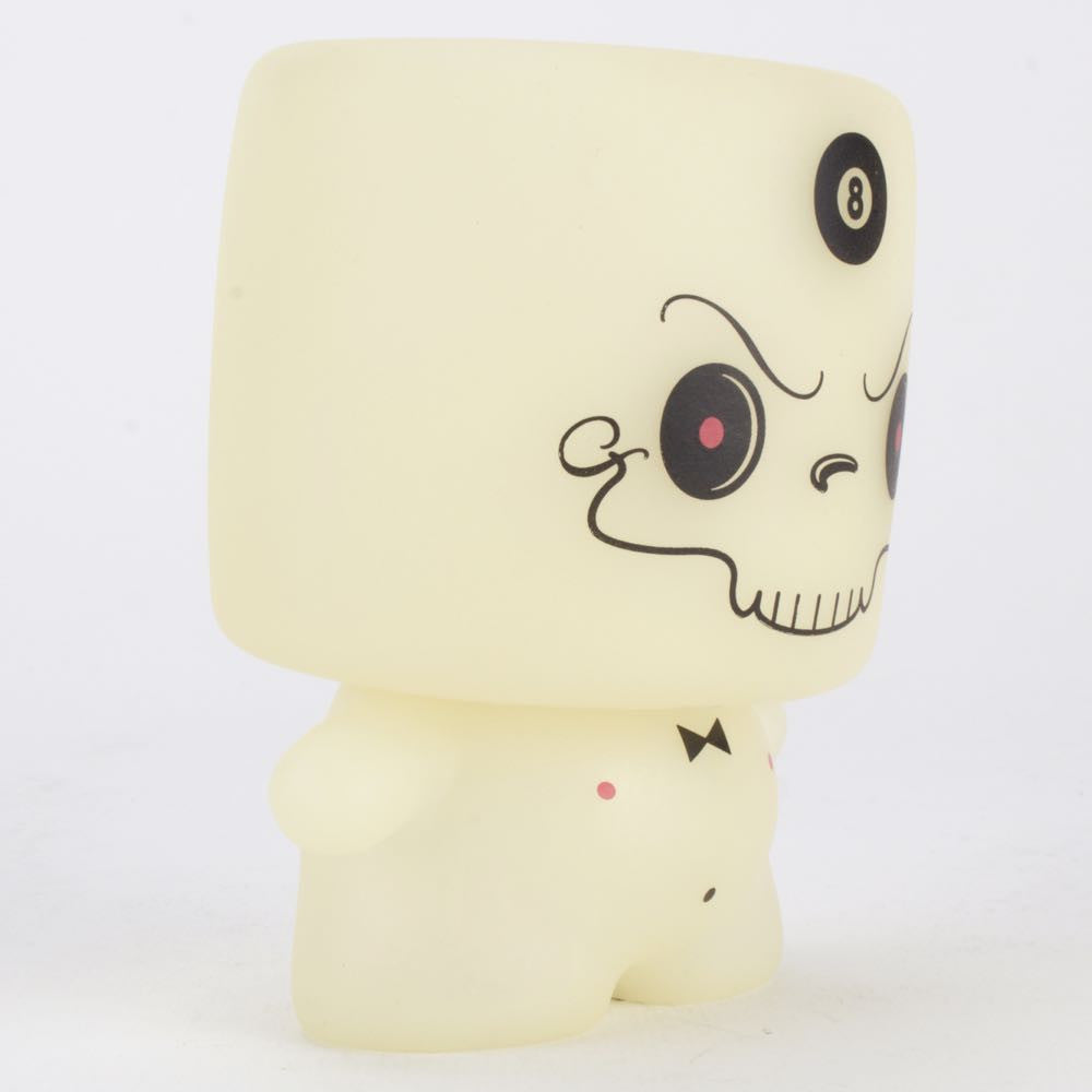 Grim Marshall by 64 Colors (Squibbles Ink + Rotofugi) is a limited edition figure with a square head, cartoon skull face, bow tie, and an