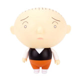 The Jimmy Corrigan Vital Animus Vinyl Doll by Presspop features the cartoon character with a large round head, sparse hair, worried expression, black vest, white shirt, and orange pants.