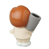 A small Medicom Vinyl Artist Gacha Series 13 - Fumharu Kun figurine, showing a brown-haired person seen from the back, holding a large gray cylinder over their shoulder; part of the collectible Series 13 figures.