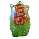 The Pop Soda Popsoda Finger Puppet - Clear Green is a green and silver frog figurine with red stylized text on its back—ideal for any kaiju puppet show collection.