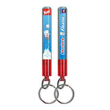 The Inked Pulp Marshall Artist Action Fob Floatie Keychain features playful blue and red novelty pens with cartoon marshmallows, “Yum!” text, and floating action—a fun accessory to liven up any key set.