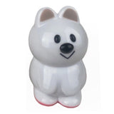The Medicom VAG 33 - Kuokka Chan is a white, cartoon-style bear figurine with black eyes, a black nose, a small smile, and pink-tinted feet, inspired by Japanese vinyl toys and shown against a plain white background.