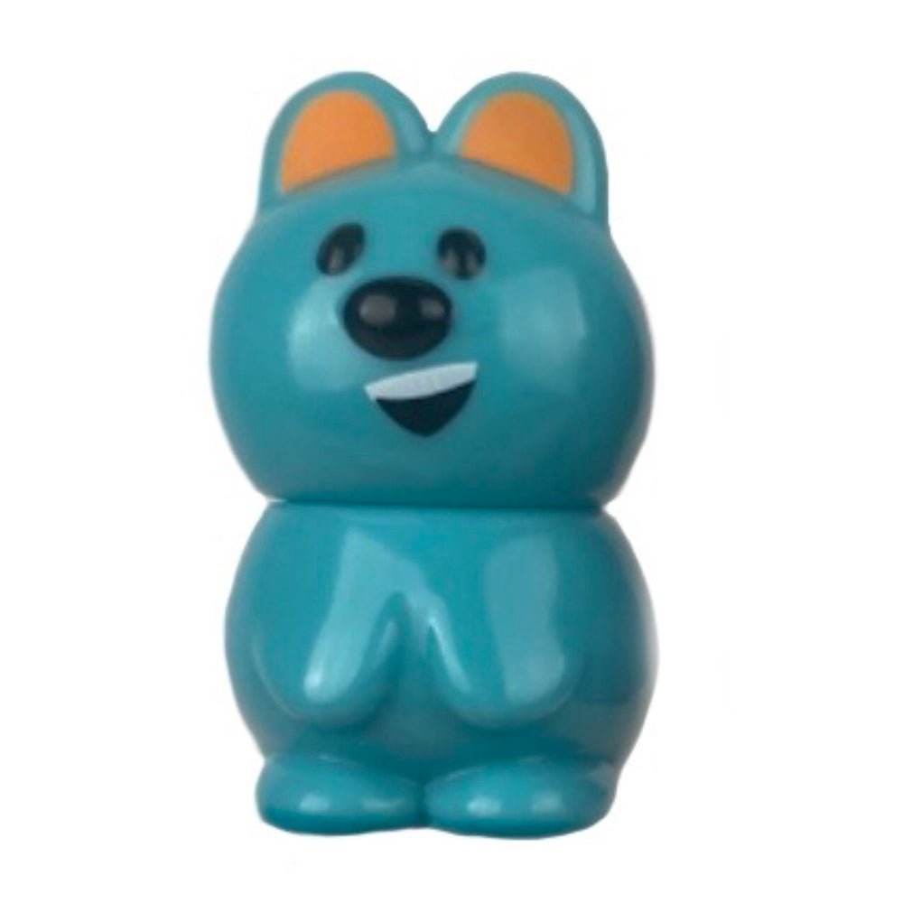 Medicom’s VAG 33 - Kuokka Chan is a blue plastic toy shaped like a cartoon animal, with orange inner ears, black nose, and a smiling face—ideal for fans of Japanese vinyl toys or gachapon figures.