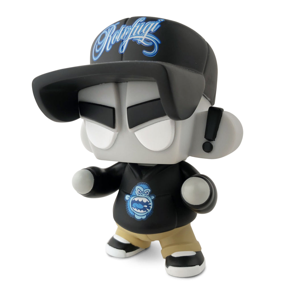 Limited edition Mad*L Citizen — Rotofugi Mad Ape vinyl by UVD Toys, featuring a large black cap, blue graphic hoodie, tan pants, white shoes, and oversized head—an essential designer toy for collectors.