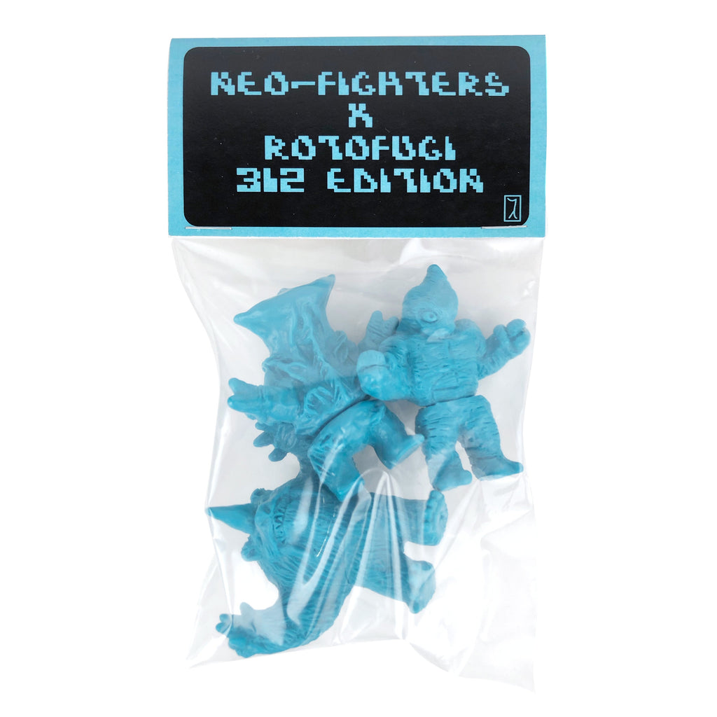 A clear plastic bag with two blue toy figures and a