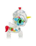 The tokidoki Sugar Shop Unicorno Blind Box features a unicorn-shaped collectible container filled with colorful candies, a red tail, yellow horn, and heart-topped lid—a sweet treat from the Sugar Shop series!.