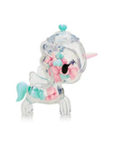The tokidoki Sugar Shop Unicorno Blind Box features a clear unicorn-shaped container filled with pastel pink, blue, and green heart candies—a sweet collectible displayed against a white background.
