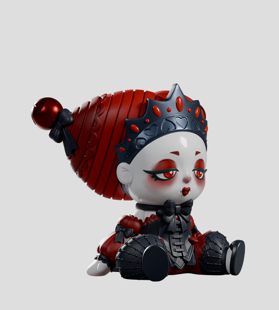 The A Mad Tea Party Blind Box by Kaleidos Creative features a toy figure with a large red hat, jeweled crown, and detailed black and red outfit, sitting neutrally on a light gray background.
