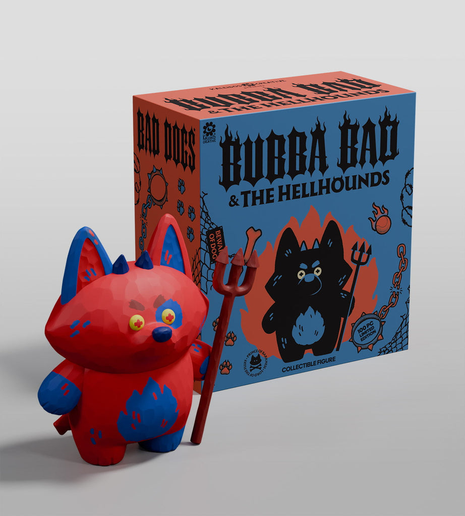 A red and blue cat-like devil dog toy holding a trident stands before a box labeled 