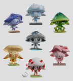 Seven colorful, mushroom-inspired Capkins — Series 2 Blind Box figurines by Kaleidos Creative, each with large eyes and unique designs, are displayed on a light gray background.