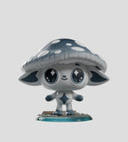 A stylized figurine with big eyes, a mushroom cap hat, and animal-like ears from the Kaleidos Creative Capkins — Series 2 Blind Box stands on a decorative base against a plain background.