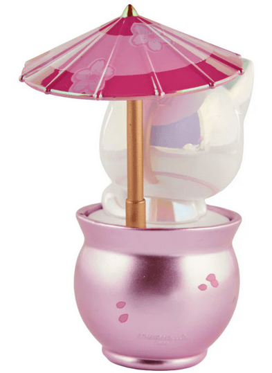 The tokidoki Cherry Blossom Cats - Special Edition Blossom Kitty features a white cat figurine in a metallic pink pot, holding a pink and red floral umbrella.