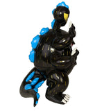 The Little Hut / Paradise Toys' Dinosuke - Black is an 8-inch vinyl figure with a black body, yellow streaks, blue bumps on the back and tail, upright stance, clawed hands and feet. Displayed on a white background.