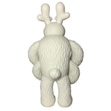 The Little Hut’s Dream Monster - OG (White) is a white, furry, cartoon-style figurine with antler-shaped horns and rounded arms, standing upright and facing away.