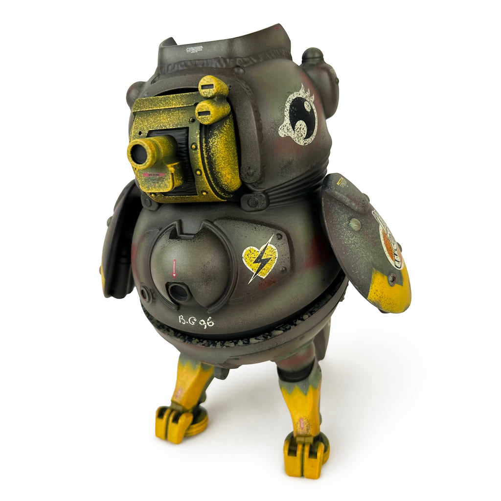 The How2Work Birdie Guard is a compact, stylized robot resembling a bird, with a camera lens beak, mechanical wings, and painted in yellow, black, and gray.