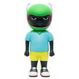 Phibby — OG (Green) by Hebru Brand is a limited edition collectible featuring a child with dark skin in a green frog helmet, blue shirt, yellow shorts, and white sneakers, standing forward.