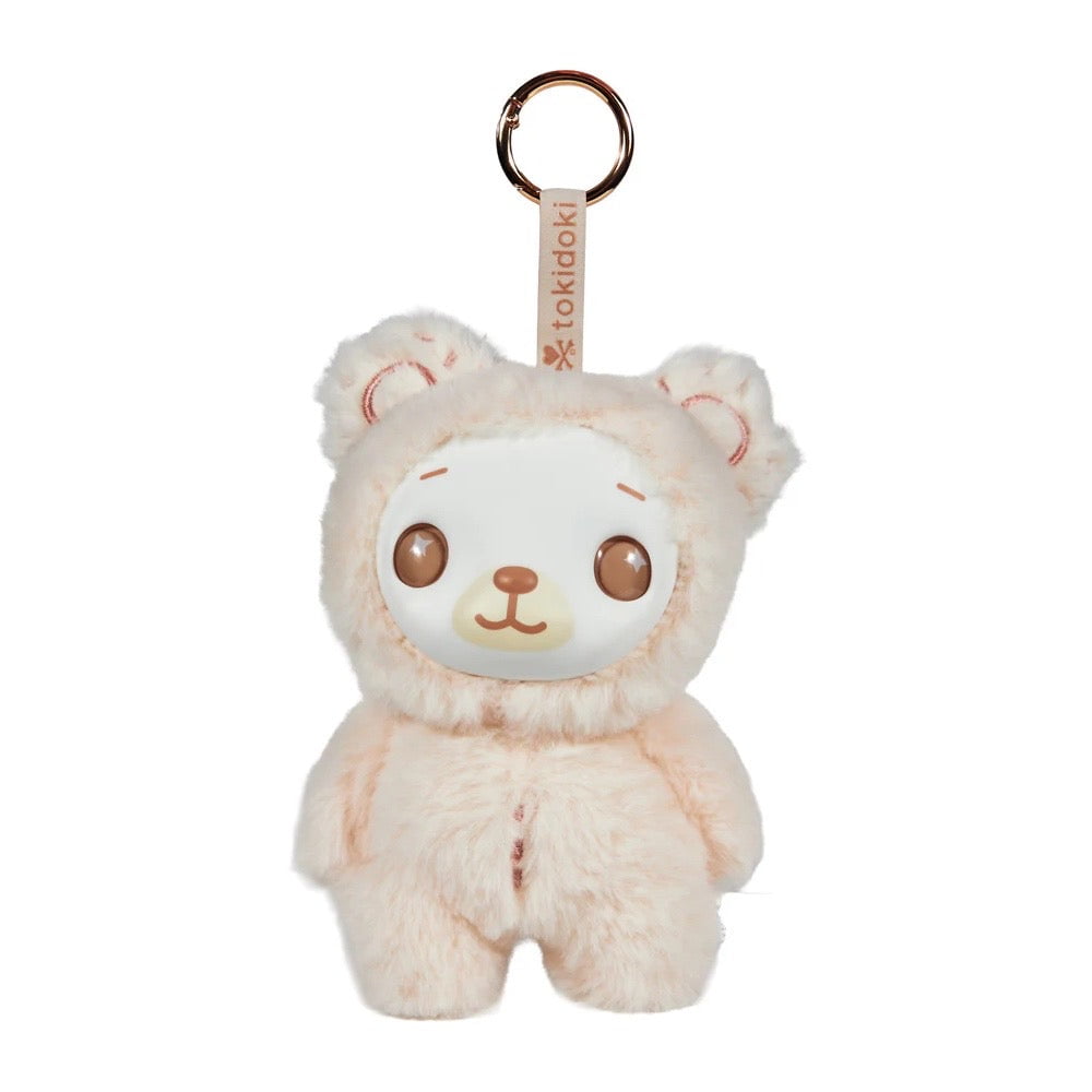 The tokidoki Soft & Sweet Vinyl Plush Blind Box features an adorable cream-colored bear keychain with round brown eyes and a neutral expression—an irresistibly cute accessory for your collection.