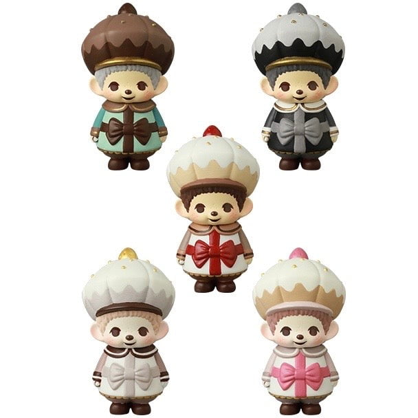 Five Monchhichi figures from Medicom's VAG 45 — Monchhichi Happy Gift Box stand in two rows, each with a poofy hat and pastel outfit. These adorable Japanese vinyl toys are inspired by Vinyl Artist Gacha gachapon figures.